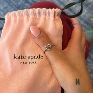 Like New Kate Spade Loves me Knot Silver Ring size 7
